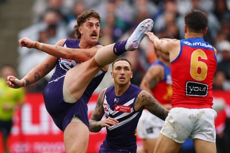 Luke Jackson kicks long as Fremantle and Brisbane finish the first half of the 2026 AFL grand final all square