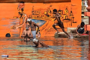 Hindu devotees bathe during Akshaya Tritiya, a spring festival which is believed to bring good luck and success,Jabalpur, India
