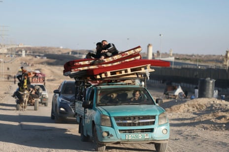 Palestinians leaving Rafah by car and cart on Wednesday.