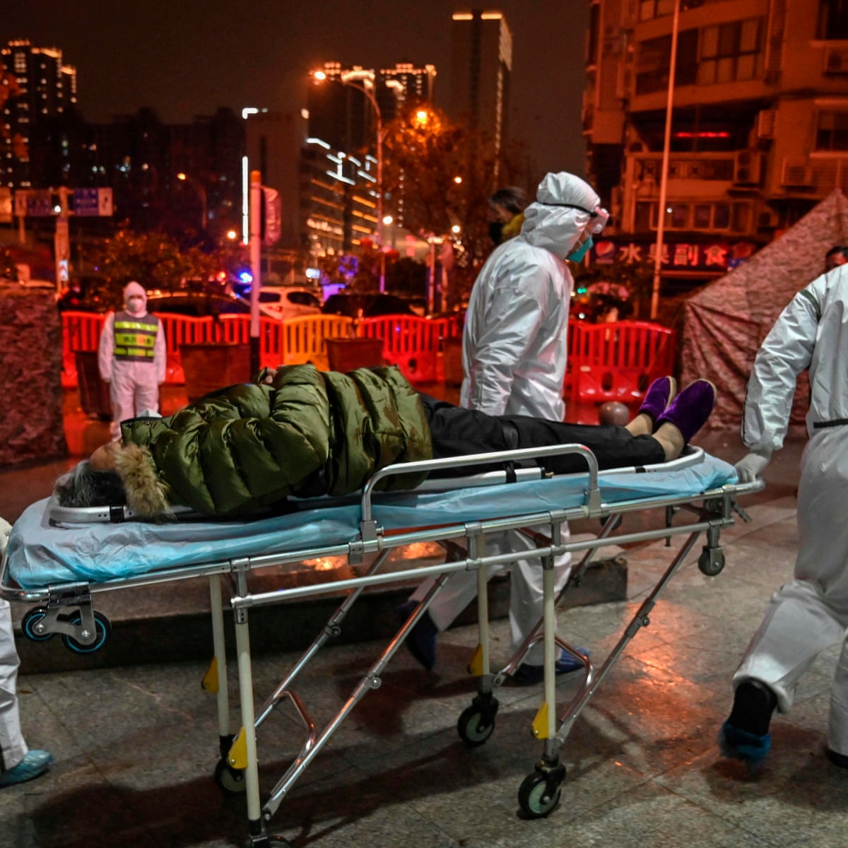 A Year After Wuhan Alarm China Seeks To Change Covid Origin Story China The Guardian