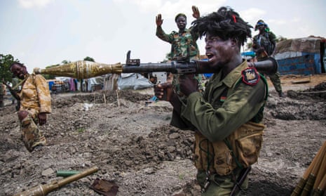 South Sudan army troops in trenches in Lelo in October