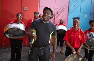 Lionel McCalman rehearses with members of the Nostalgia Steel band