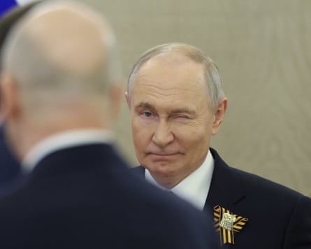 Vladimir Putin appears to wink