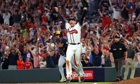 Freddie Freeman celebrates the Braves’ win over the Brewers