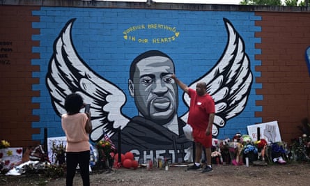 People visit a makeshift memorial for George Floyd in his former neighborhood, the Third Ward, in Houston, Texas, in June.