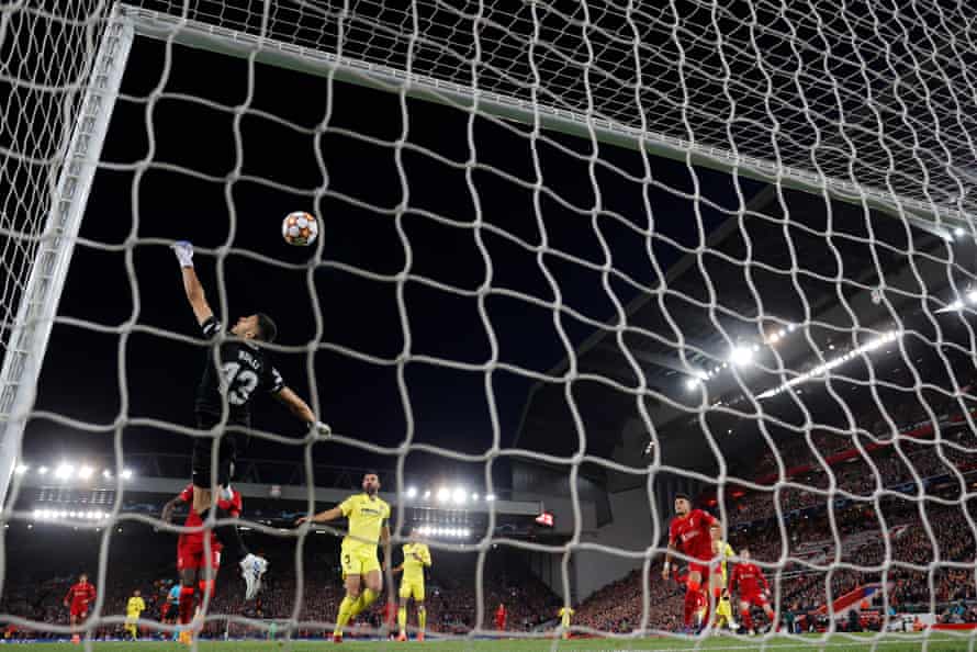 Liverpool’s Jordan Henderson cross is deflected by Villarreal’s Pervis Estupinan and goes over Villarreal keeper Geronimo Rulli and into the net for the opening goal of the night.