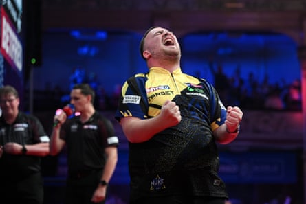 Luke Littler celebrates after his victory against Gerwyn Price at the World Matchplay final.