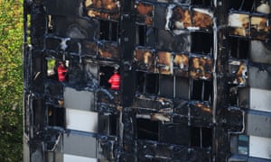 Search and rescue officers from London fire brigade inside Grenfell Tower on Saturday.