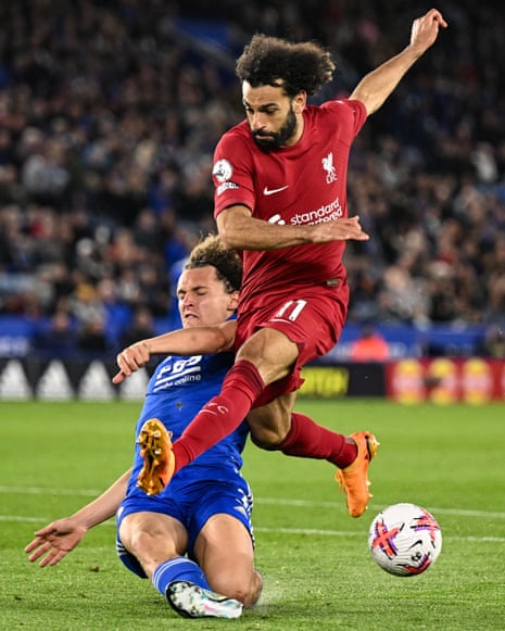 Liverpool's Mohamed Salah is denied by a fine tackle by Leicester City's Wout Faes.