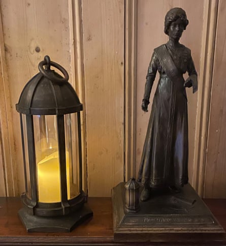 A model of the Mary Clarke statue and a copy of her lamp.