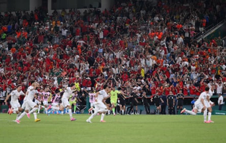 Morocco players group disconnected aft Ismael Saibari astatine nan conclusion of nan shootout.
