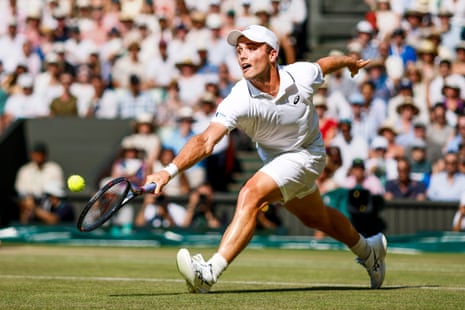 British wildcard player Arthur Fery reaches the semi-finals at Wimbledon in action here stretching to hit the ball