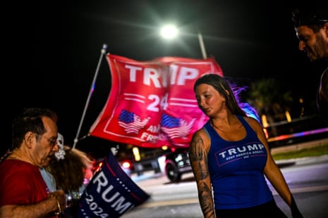 Supporters of former US President Donald Trump protest near the Mar-a-Lago Club in Palm Beach, Florida last night.