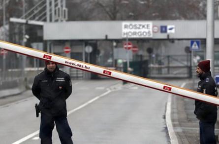 Hungarian police guard the closed “Horgos 2” border crossing into Hungary