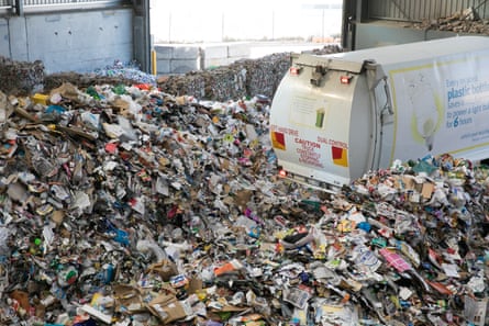 A truck unloads recyclable materials, collected in the kerbside yellow bins, at the Hume recycling site.