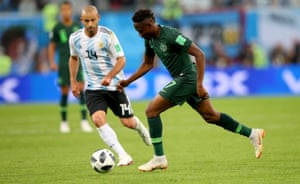 Musa goes past Mascherano.