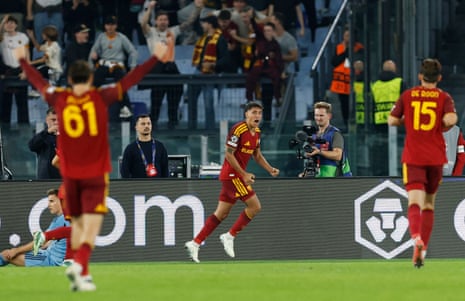 Nahuel Molina celebrates with clenched fists after scoring a goal for Roma