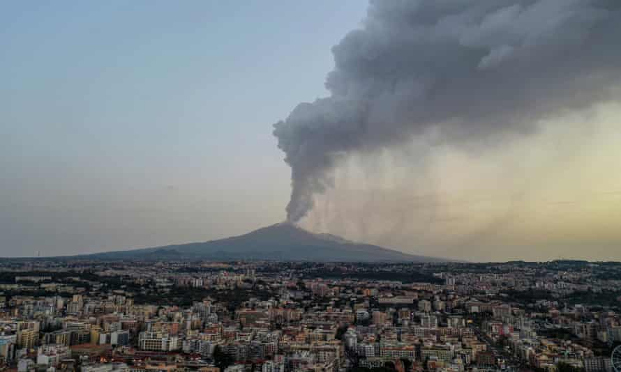 The Italian city of Catania at dawn on Monday with Mount Etna in the background.