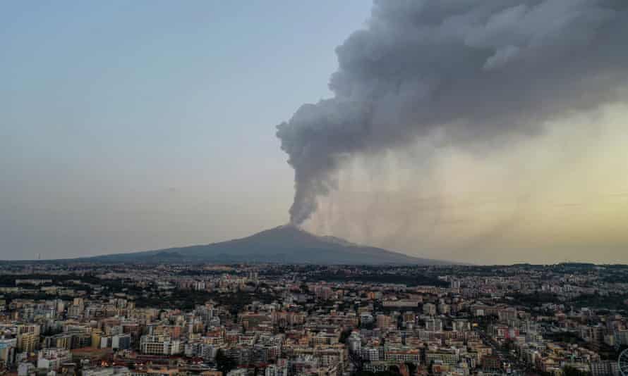 The Italian city of Catania at dawn on Monday with Mount Etna in the background.