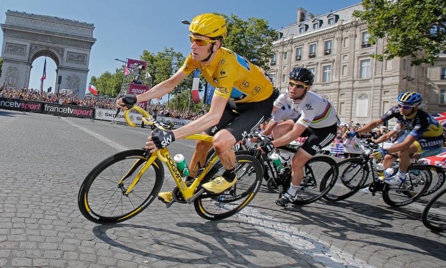 Bradley Wiggins leads the peloton into Paris in his victorious Tour de France campaign in 2012.