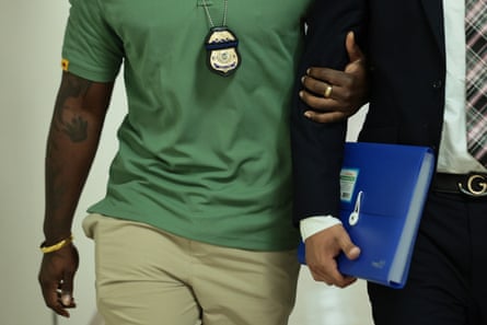 two people with their arms interlocked