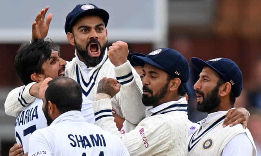 Virat Kohli and teammates celebrate after the successful appeal against Jonny Bairstow