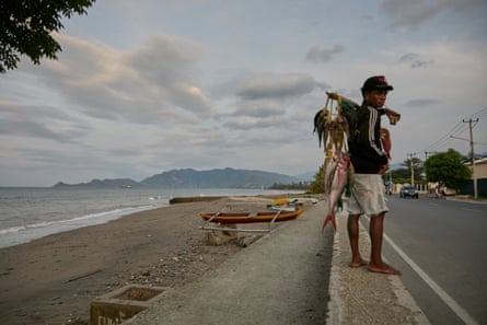 A man selling fish
