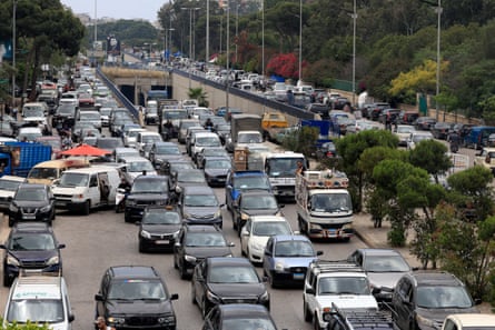 A highway with long queues of cars and lorries