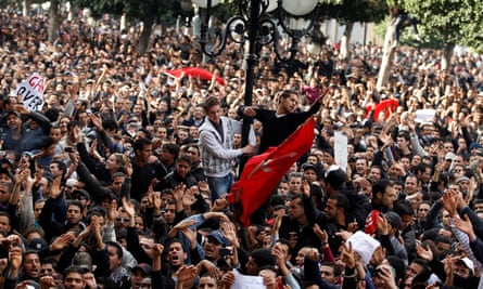 Protesters demonstrate Ben Ali in Tunis, on 14 January 2011.
