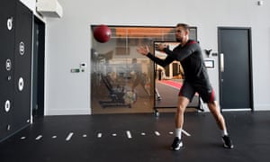 Jordan Henderson throws a ball to his invisible friend