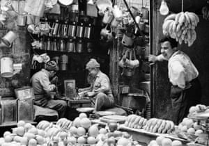 Fruit seller and tin smith market, Tripoli, Lebanon, 1960