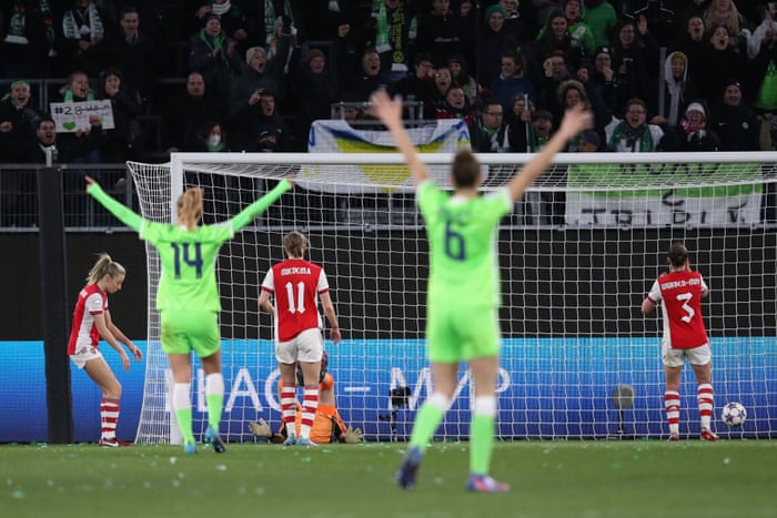 Joy for the Wolfsburg players and fans after Leah Williamson (left) put the ball into her own net to double the home side’s lead.