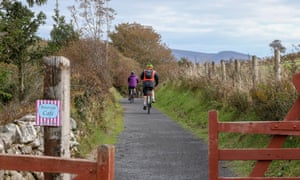 People cycling on the Great Western Greenway, in County Mayo
