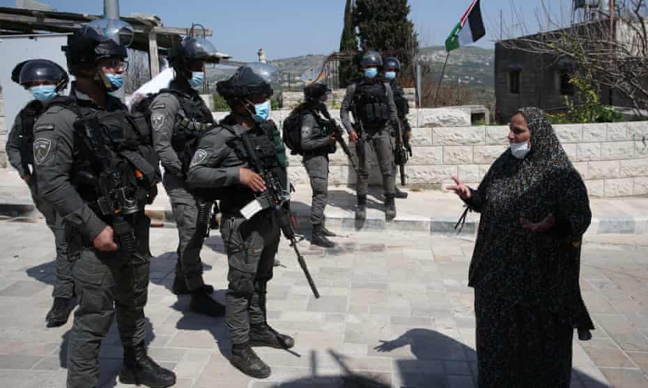 A Palestinian woman protests in the Israeli-occupied West Bank