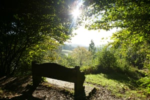 Bench in foreground and view south from Ide Hill. The seat is dedicated to Octavia Hill, the Victorian open space champion who created the National Trust