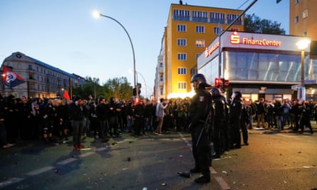 Security forces face protesters in Berlin on Wednesday.