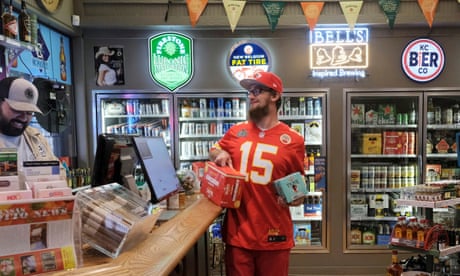 A man buys beer ahead of the first NFL game of the season in Leavenworth, Kansas, on 10 September 2020.