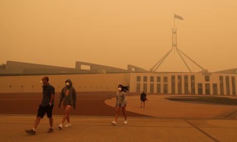 ‘Sociologist Ulrich Beck wrote that smog is the great equaliser; none of us can escape it. But smog, and smoke, do not affect us equally.’ Visitors to Parliament House in Canberra wear face masks after hazardous smoke from bushfires blankets the city.