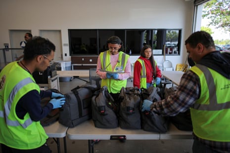 Election workers process ballot security drop bags during the California primary election at the Los Angeles County Ballot Processing Center in City of Industry, California, U.S., June 2, 2026. REUTERS/Daniel Cole