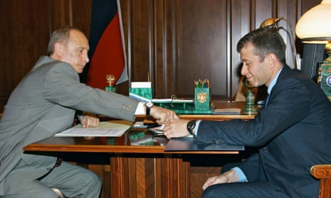 Russian President Vladimir Putin (L) meets with Chukotka region governor Roman Abramovich in the Moscow Kremlin, in this May 27, 2005 file photo. 