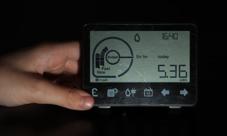 A person holding a smart meter.
