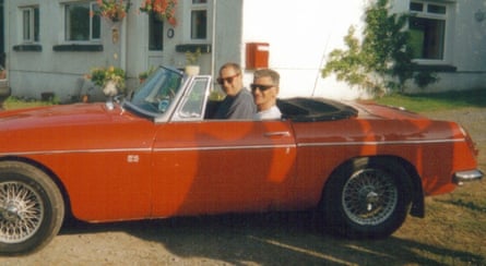Martin and his uncle Colin smile for the camera from the 1967 MGB roadster