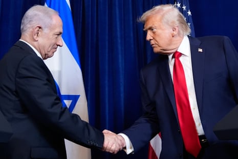 President Donald Trump shakes hands with Israel's prime minister Benjamin Netanyahu during a news conference at Mar-a-Lago, Dec. 29, 2025, in Palm Beach, Fla.