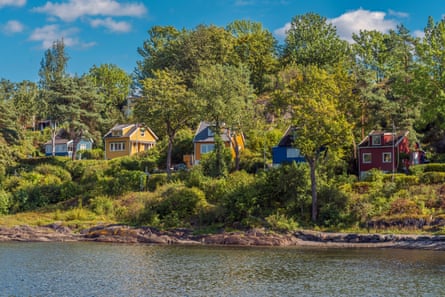 Small colourful cottages on a woody island
