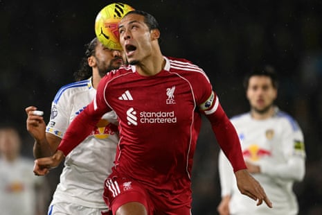 Virgil van Dijk and Dominic Calvert-Lewin vie for a header