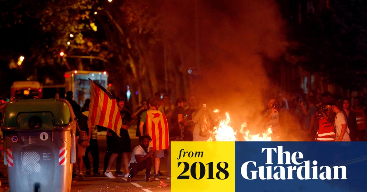 Tensions flare at Barcelona protests on anniversary of independence vote