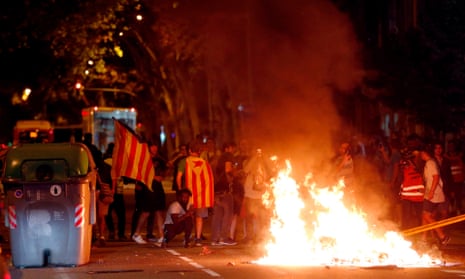 Protesters burn rubbish during the demonstration in Barcelona. 