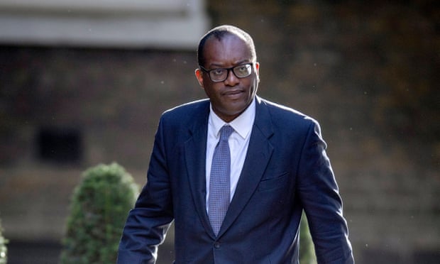 Kwasi Kwarteng arrives for a cabinet meeting at Downing Street in London.