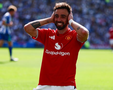 Bruno Fernandes celebrates after scoring for Manchester United at Brighton
