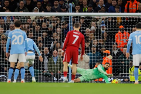 Manchester City’s Erling Haaland has his penalty saved by Liverpool’s Giorgi Mamardashvili.
